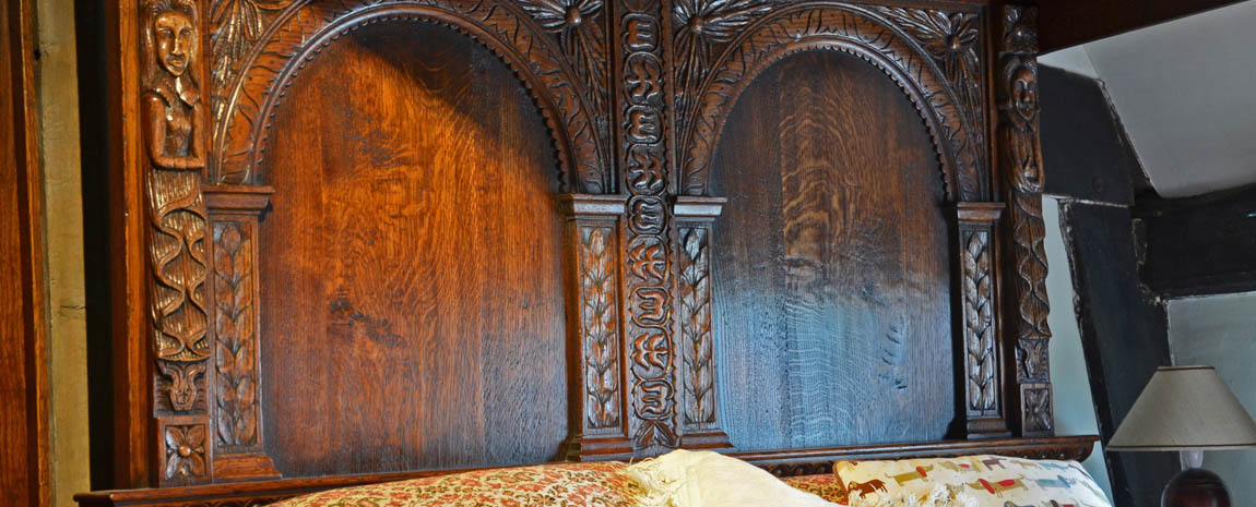 Oak Four Poster Bed with Hand Carved detail