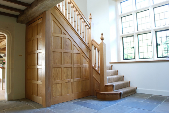 Light Oak Staircase with Double Bullnose Treads,Panelled Under-stairs Cupboard accessed through Jib Doors