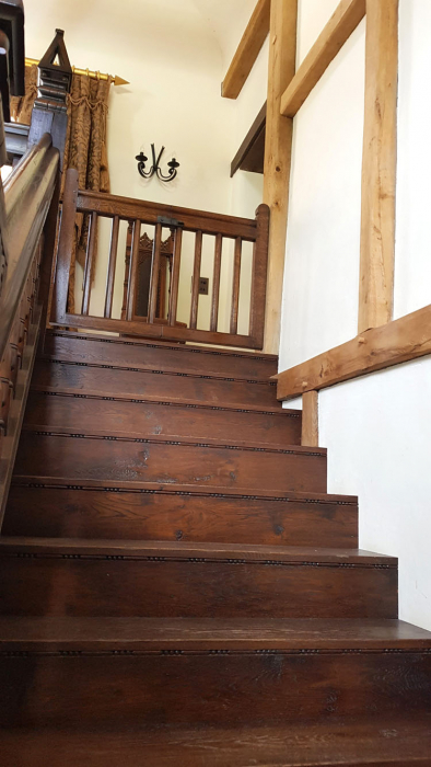 Oak staircase with carved detail to risers and gate