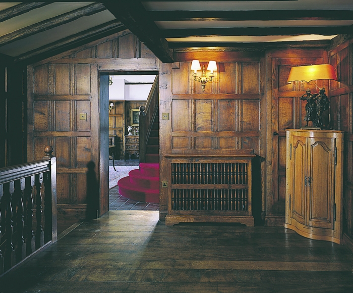 Oak 17th Century Style Panelled Interior with Beams and Radiator Cover