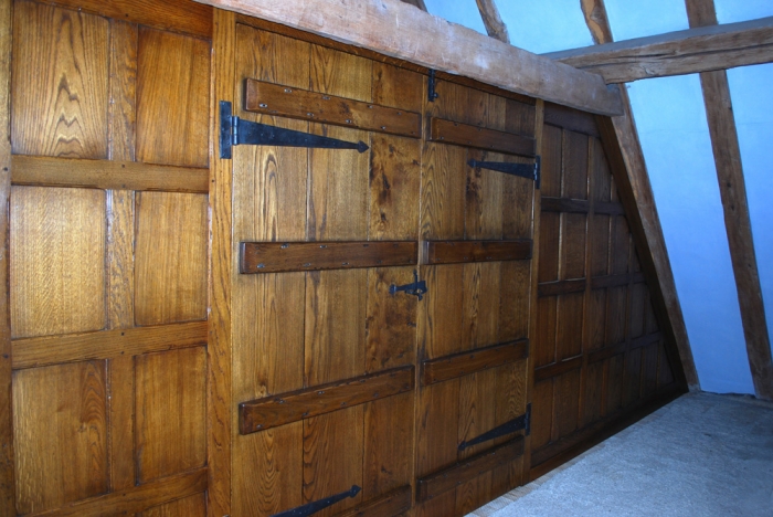 Oak Panelled Screen with a pair of Ledged Doors (This is the opposite side of the Bookcase Screen)