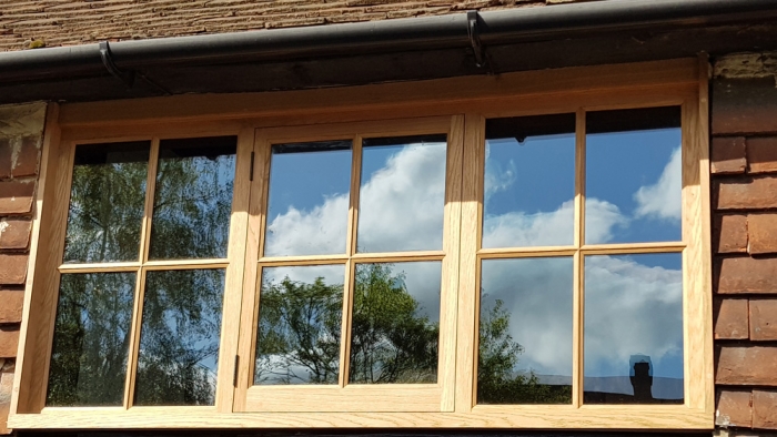 Solid Oak Window with Direct Glazed side lights and centre opener using Slim Double Glazed Units
