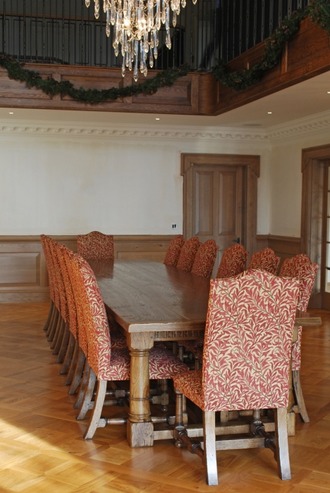 Oak Refectory Table with Six Gun Barrel Legs and Arch Carved Rails with a set of Fully Upholstered Chairs