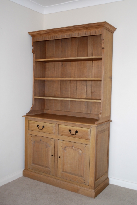 Light Oak Dresser and Rack,when opened the doors slide inside the Dresser