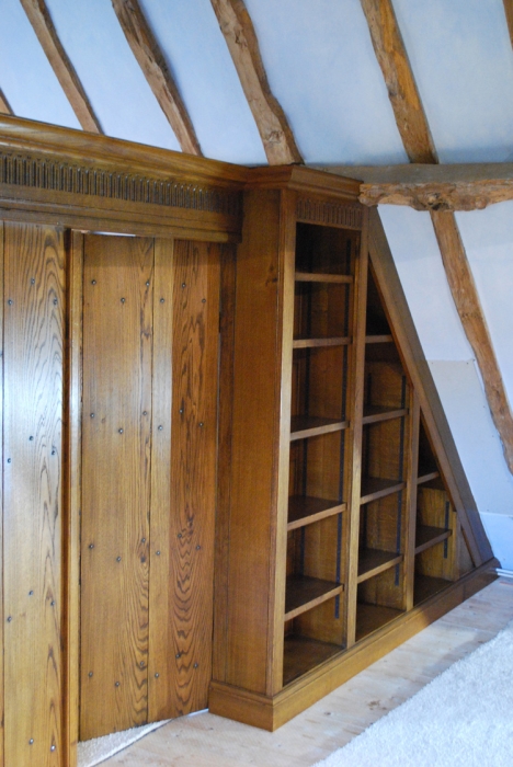 Fitted Oak Bookshelves with Hand Carving