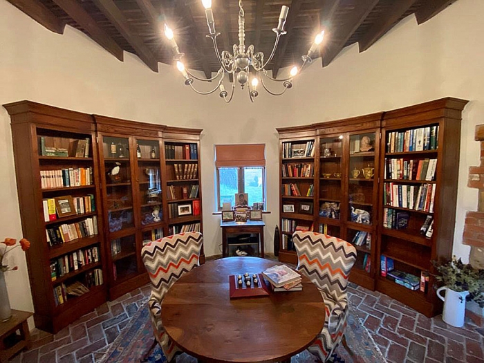 A pair of Curved Bookcases with Glazed Doors to the centres