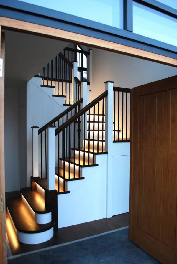 Black Walnut and Painted Tulip Wood Staircase with Black Powder Coated Balustrades