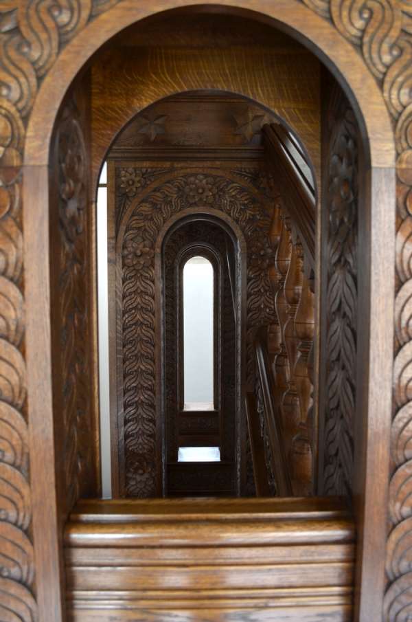 Showing some of the column arch Hand Carved detail of the Oak Staircase