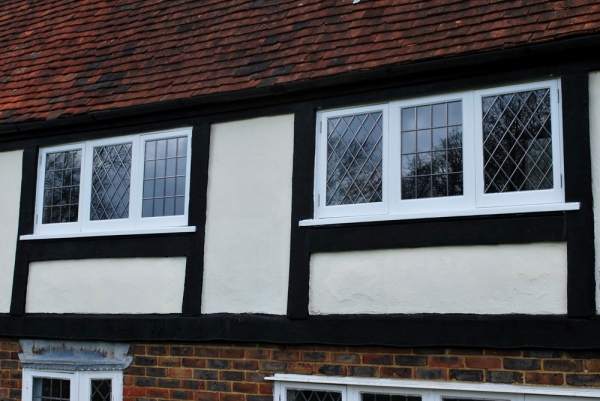 Replaced hardwood windows with a mixture of square and diamond lead lights
