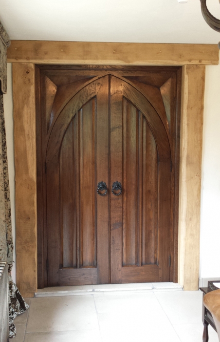 Pair of Heavily Moulded Oak Internal doors with a Heavy Sectioned Hand Carved Oak Frame