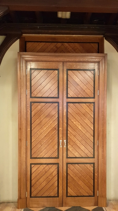 An impressive pair of Oak Doors with large bespoke Architrave