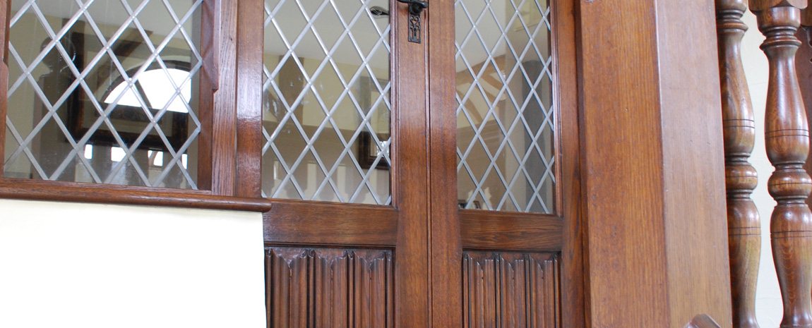 Oak Linenfold Panelled Door with Lead Lights