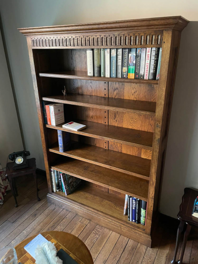 A small Hand Carved Oak Bookcase