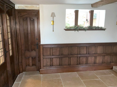 Oak Door with Linenfold Panels and Solid Oak Wall Panelling