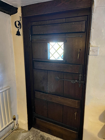 Inside view showing hand forged ironmongery